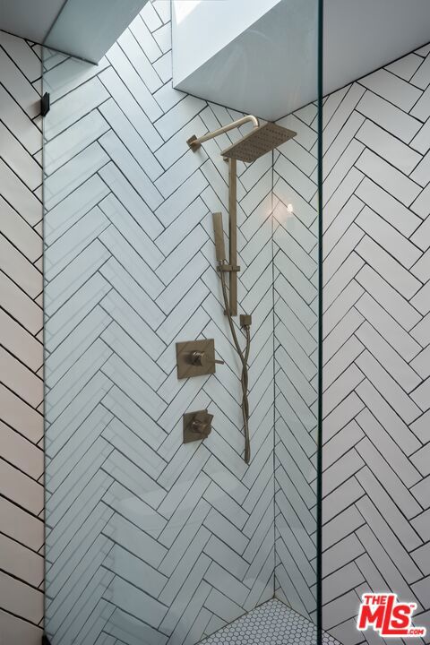 room details with a tile shower