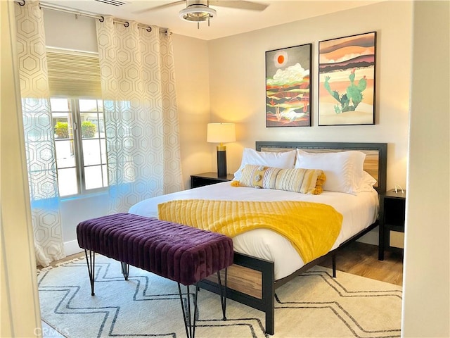 bedroom with wood finished floors