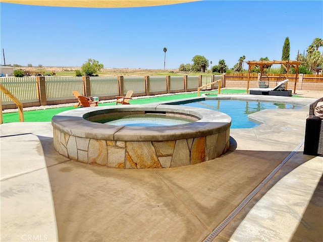 view of pool with an in ground hot tub and a patio area