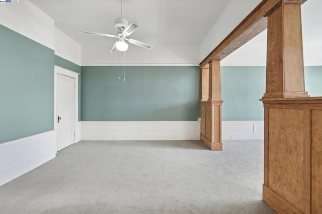 empty room with ceiling fan and carpet floors