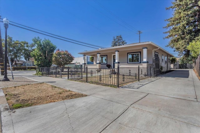 single story home with a porch