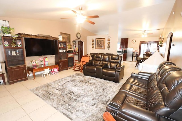 living room with light tile patterned floors, ceiling fan, and lofted ceiling