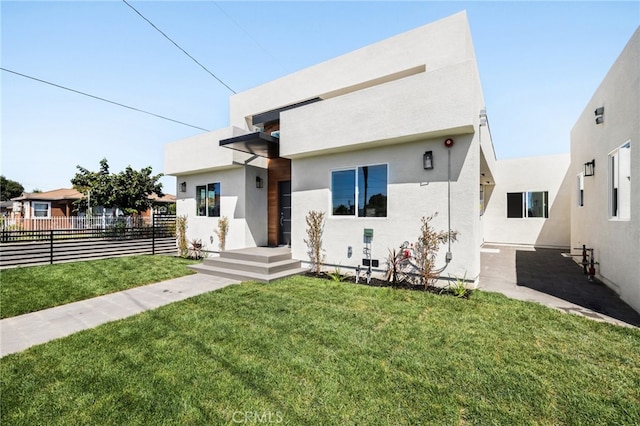 view of front of house with a front lawn