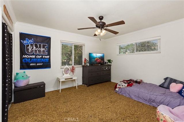 carpeted bedroom featuring ceiling fan and crown molding