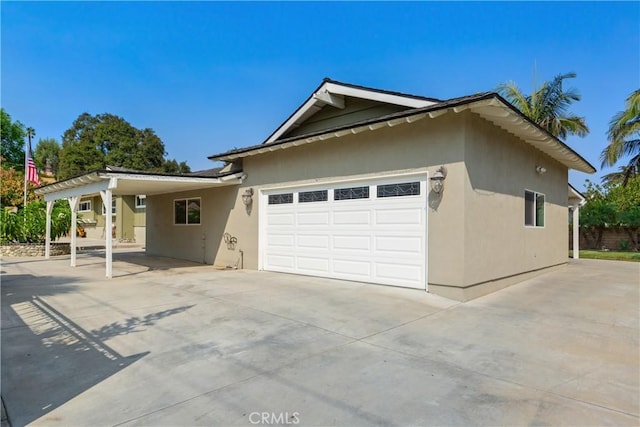 view of side of property featuring a carport