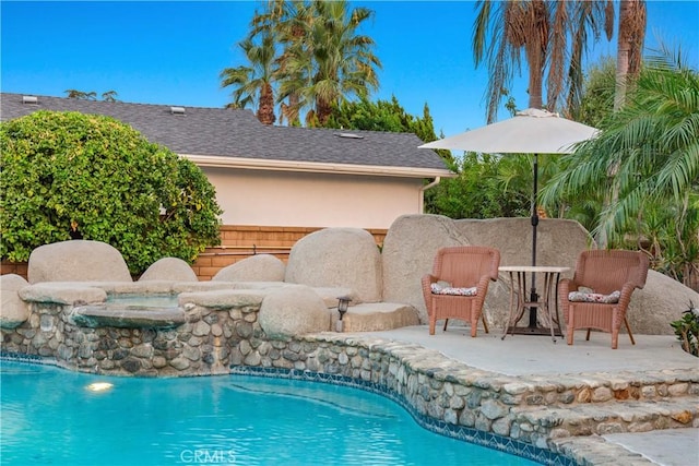 view of swimming pool featuring a patio