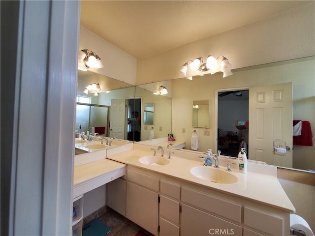 bathroom with ceiling fan and vanity