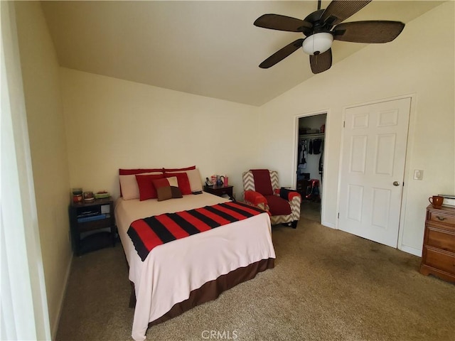 carpeted bedroom with a closet, a spacious closet, ceiling fan, and lofted ceiling