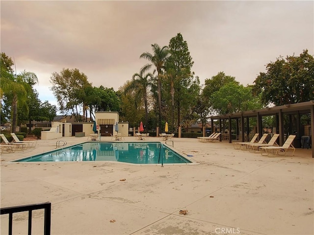 view of swimming pool featuring a patio