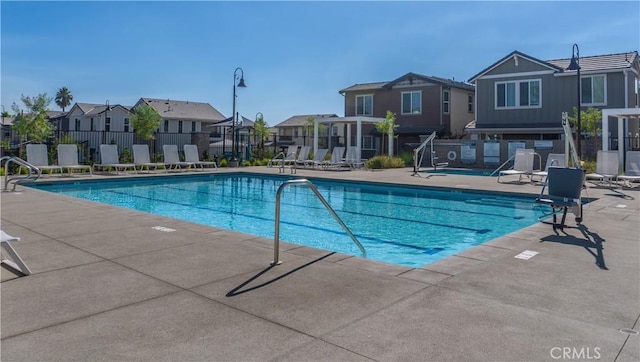 view of swimming pool featuring a patio