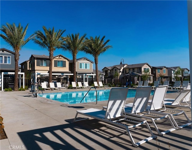 view of swimming pool with a patio