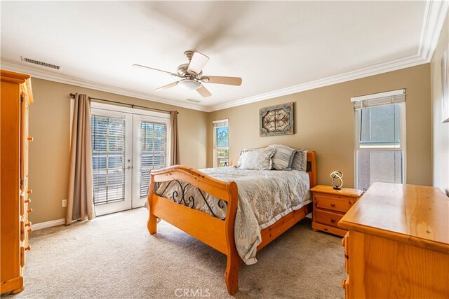 carpeted bedroom featuring access to exterior, crown molding, ceiling fan, and french doors