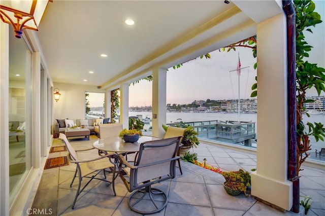 view of patio terrace at dusk