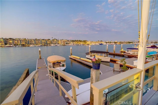 view of dock with a water view