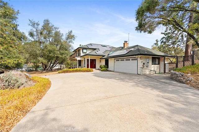 view of front of property with a garage