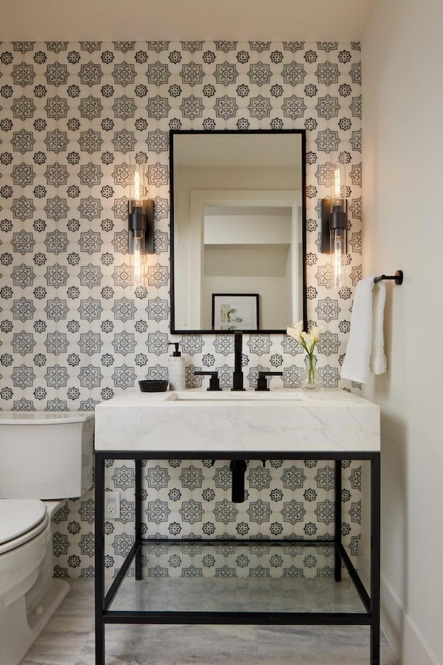 bathroom with vanity and toilet