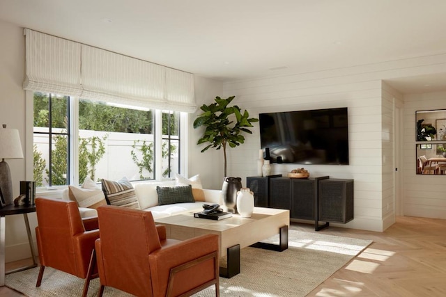 living room with light parquet floors