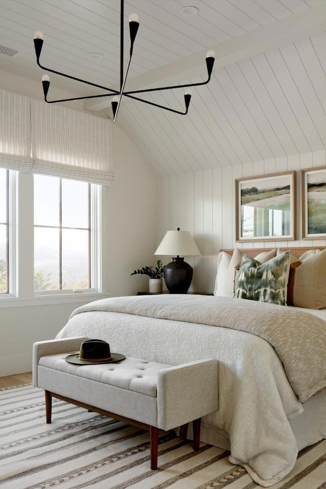 bedroom with wood-type flooring, wood ceiling, and multiple windows