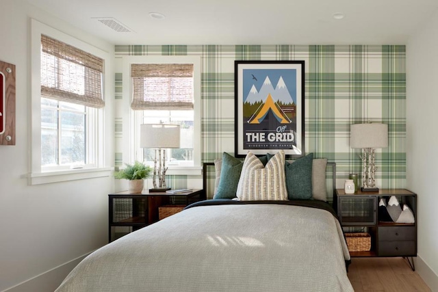 bedroom featuring hardwood / wood-style flooring