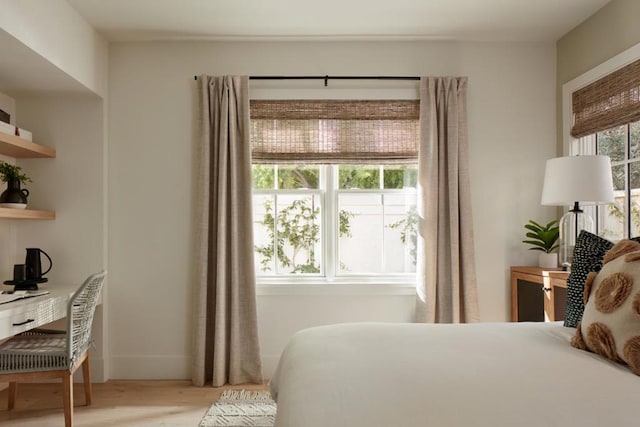 bedroom with light hardwood / wood-style flooring