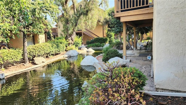 exterior space featuring a small pond