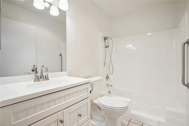 full bathroom with toilet, tile patterned flooring, vanity, and bathtub / shower combination