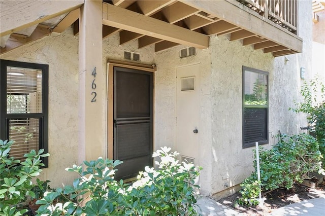 doorway to property with a balcony