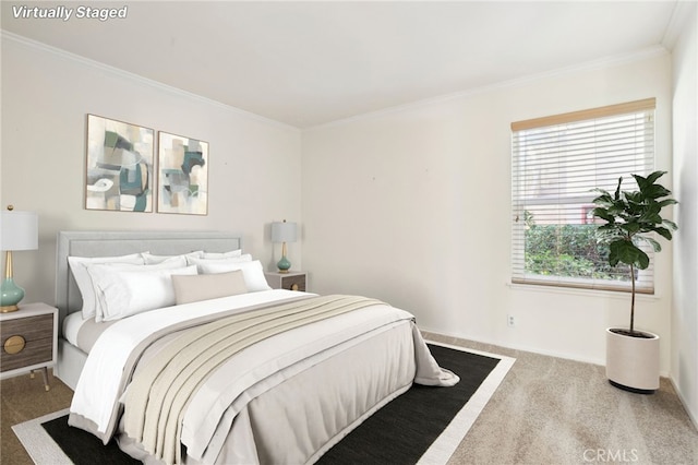 carpeted bedroom featuring crown molding