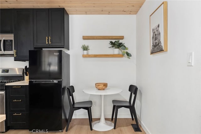 dining space with wood ceiling and light wood-type flooring