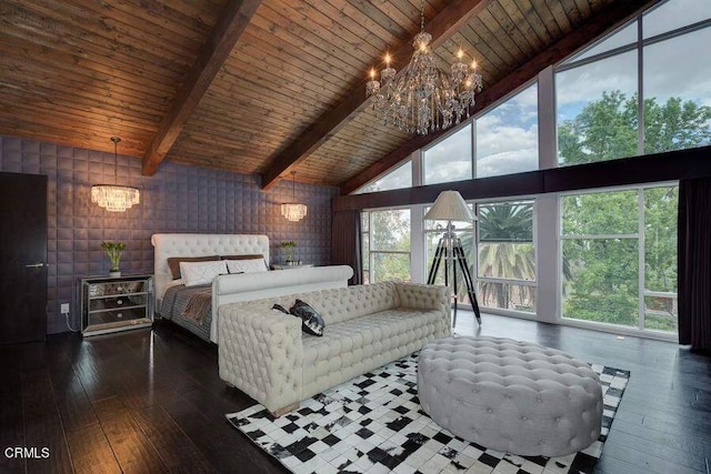 bedroom with a chandelier, dark hardwood / wood-style flooring, and multiple windows