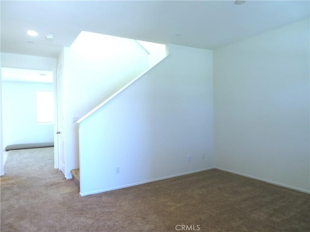 bonus room with carpet floors