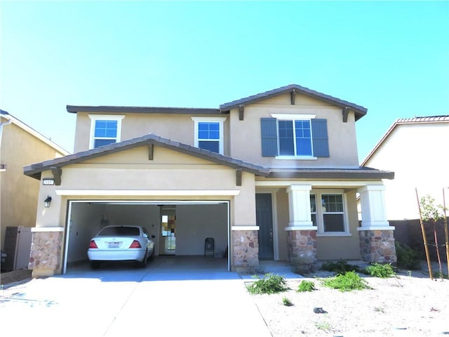 view of front of property with a garage