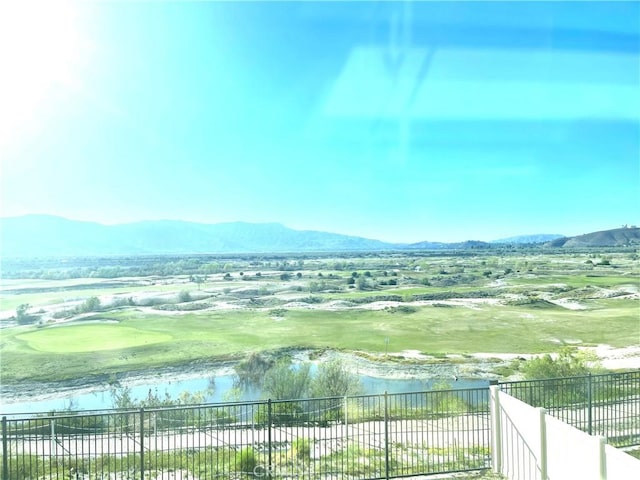 view of mountain feature with a water view