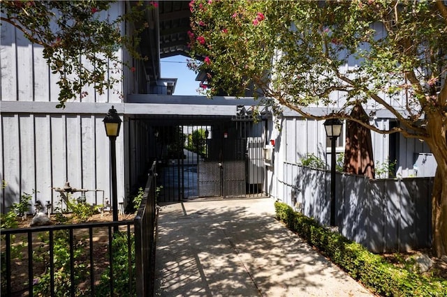 view of gate featuring a carport