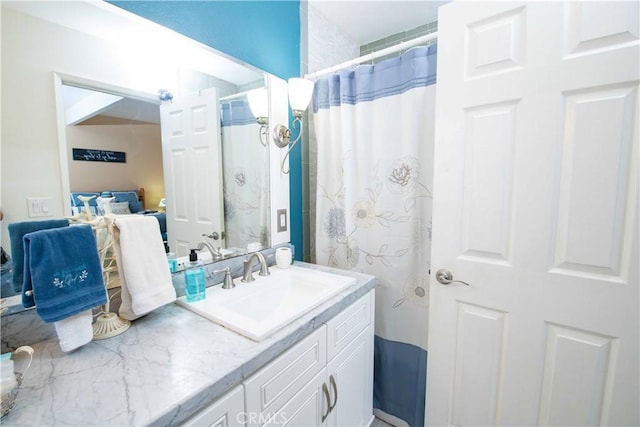 bathroom featuring vanity and walk in shower