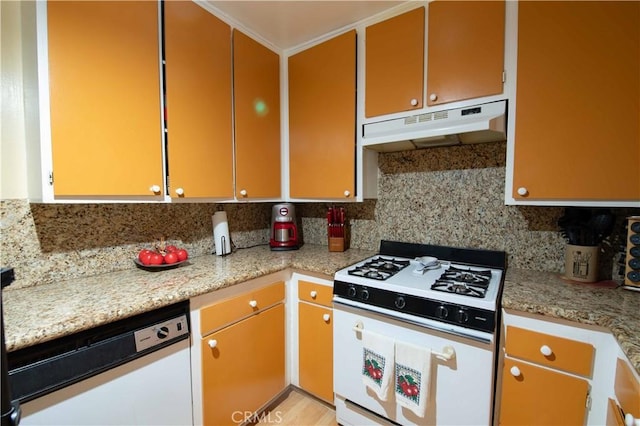 kitchen with light stone countertops, white appliances, crown molding, and light wood-type flooring