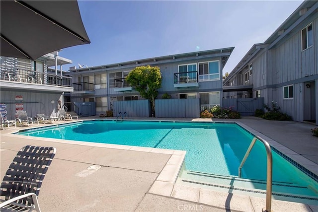 view of swimming pool featuring a patio area