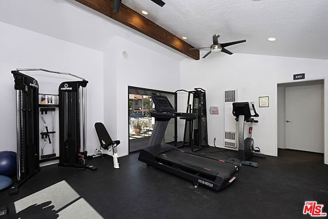 workout room featuring a textured ceiling, vaulted ceiling, and ceiling fan