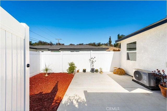 view of patio / terrace featuring ac unit