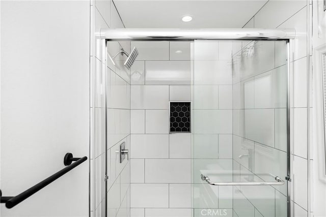 bathroom with an enclosed shower