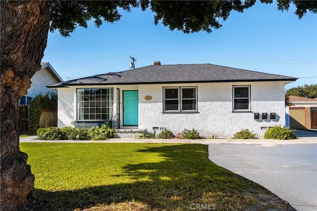 view of front of house with a front yard