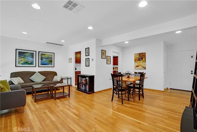 living room featuring light wood-type flooring