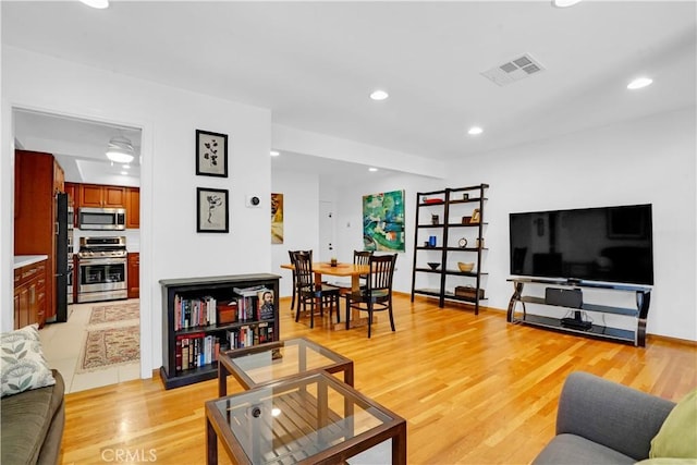 living room featuring light hardwood / wood-style floors