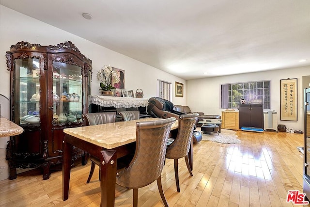 dining space featuring light hardwood / wood-style flooring