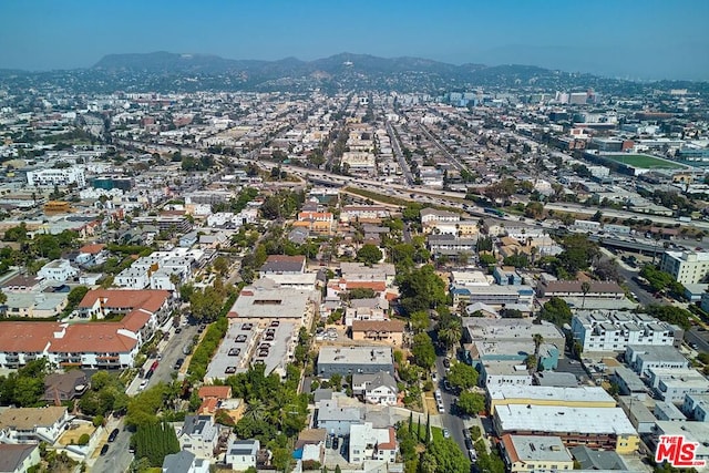 drone / aerial view featuring a mountain view