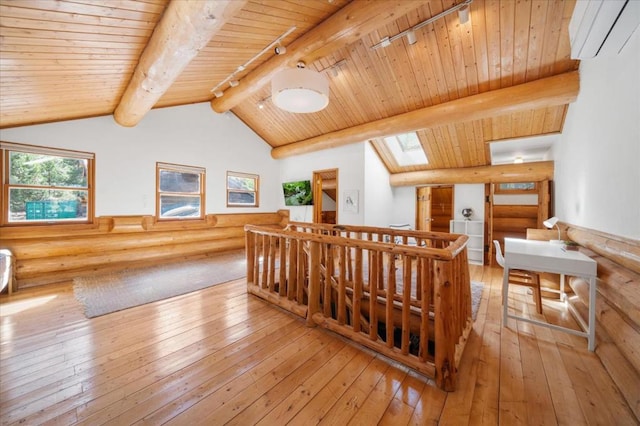 bonus room with log walls, light hardwood / wood-style floors, wooden ceiling, and a wall unit AC