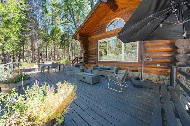 deck featuring outdoor lounge area