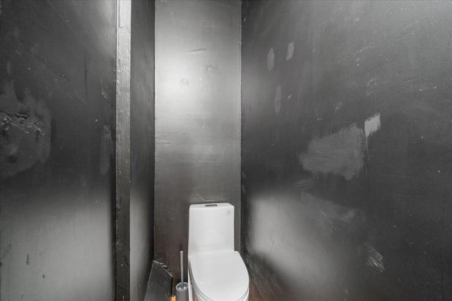 bathroom featuring toilet