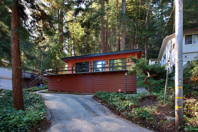 view of front of house with a deck