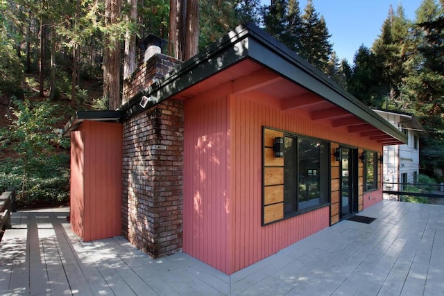 view of home's exterior with a deck